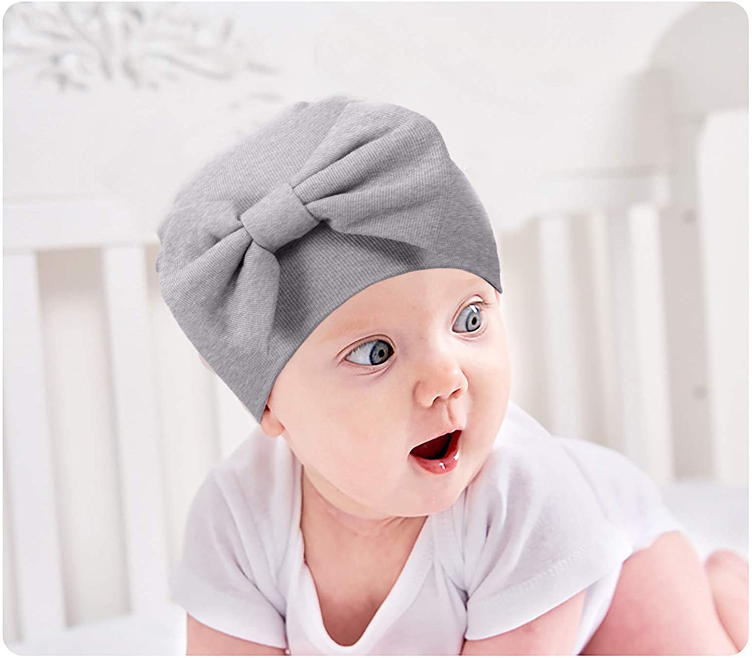 Cappello neonato con fiocco